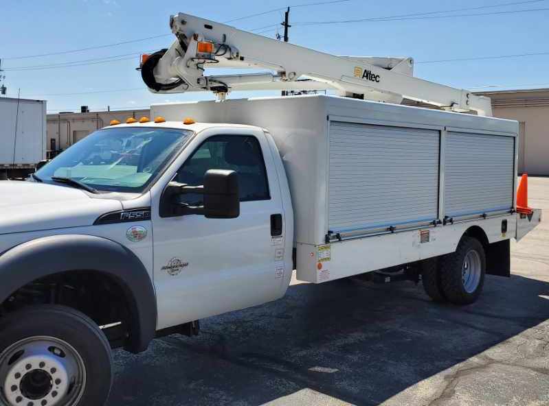 Parking lot lighting service truck